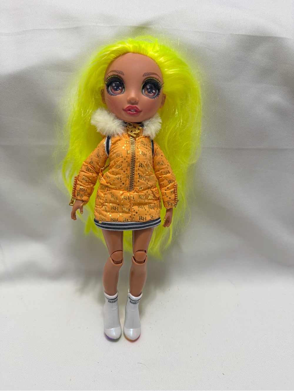 Rainbow Neon Yellow-Haired Fashion Doll in Orange Puffer Coat
